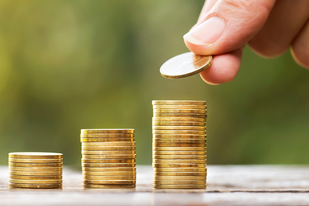 Growing gold money coins and hand, financial services concept, banner SoftwareTech